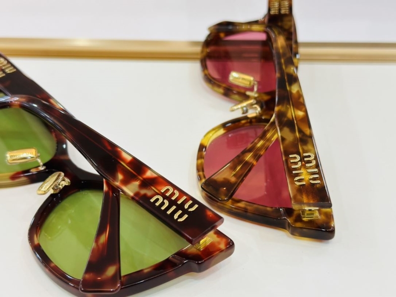 Miu miu Sunglasses